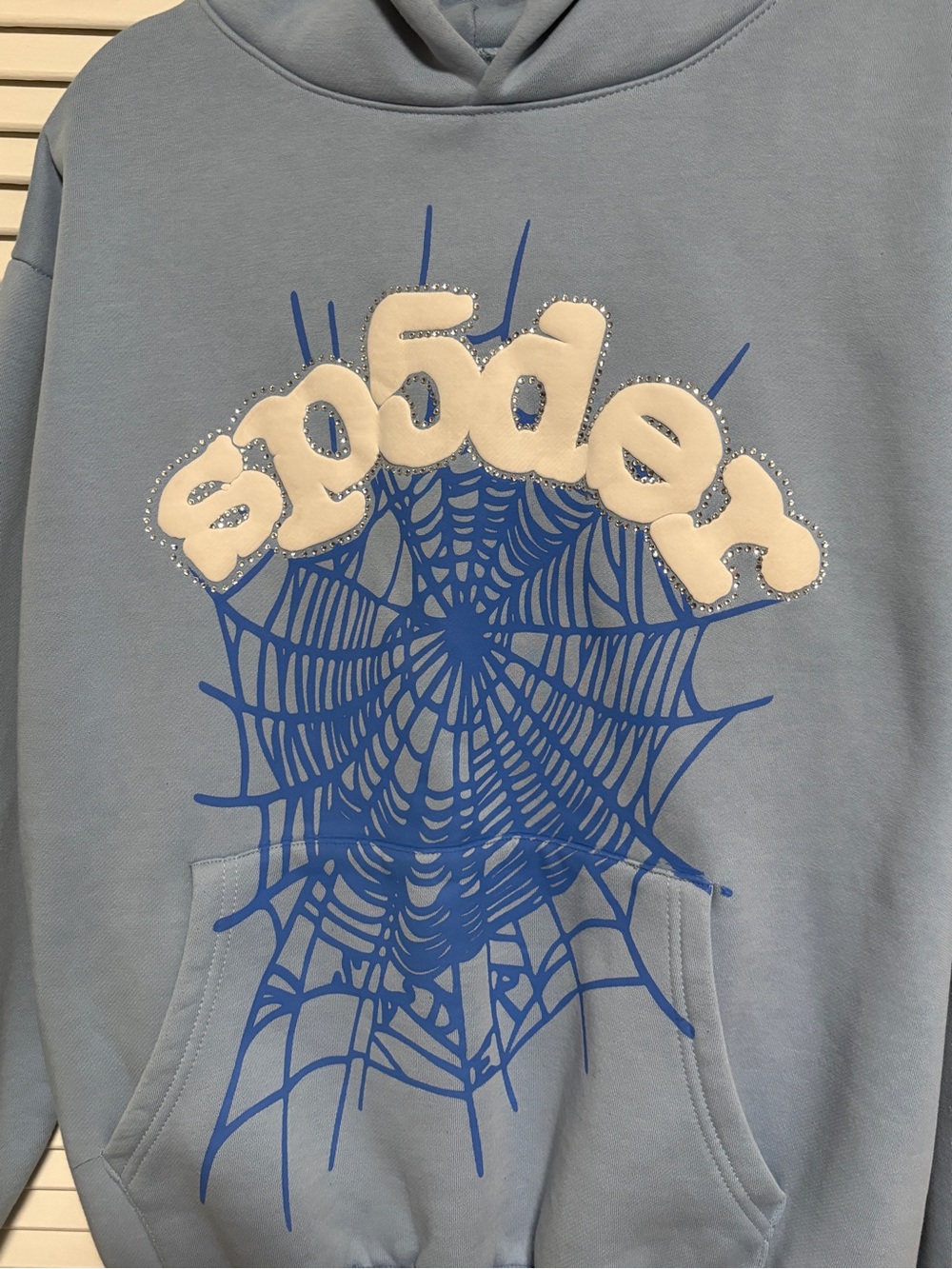 Neff Light Blue Crewneck Sweatshirt with Blue Spiderweb Graphic